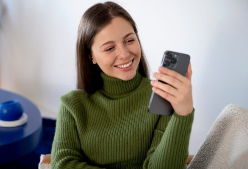 woman-talking-her-smartphone-using-handsfree-feature-scaled.jpg